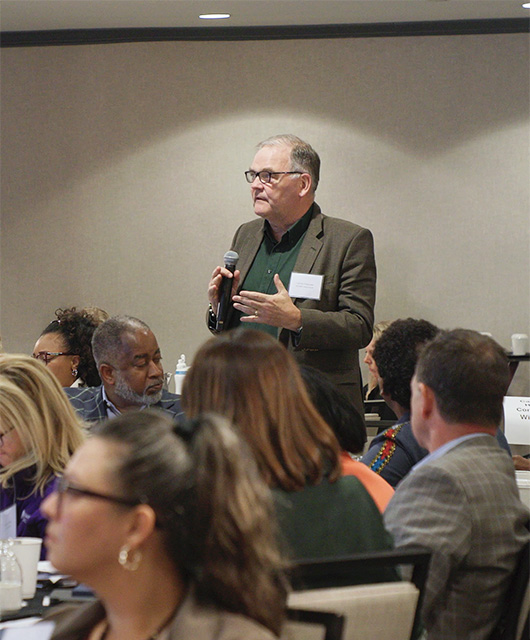 Doctor addressing group