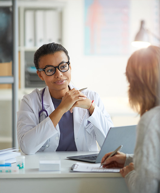 Doctor with patient at clinic