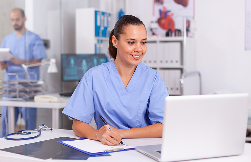 nurse on laptop